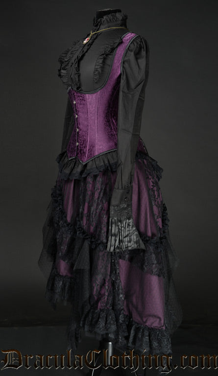 Side view of purple and black skirt with purple corset and black blouse outfit