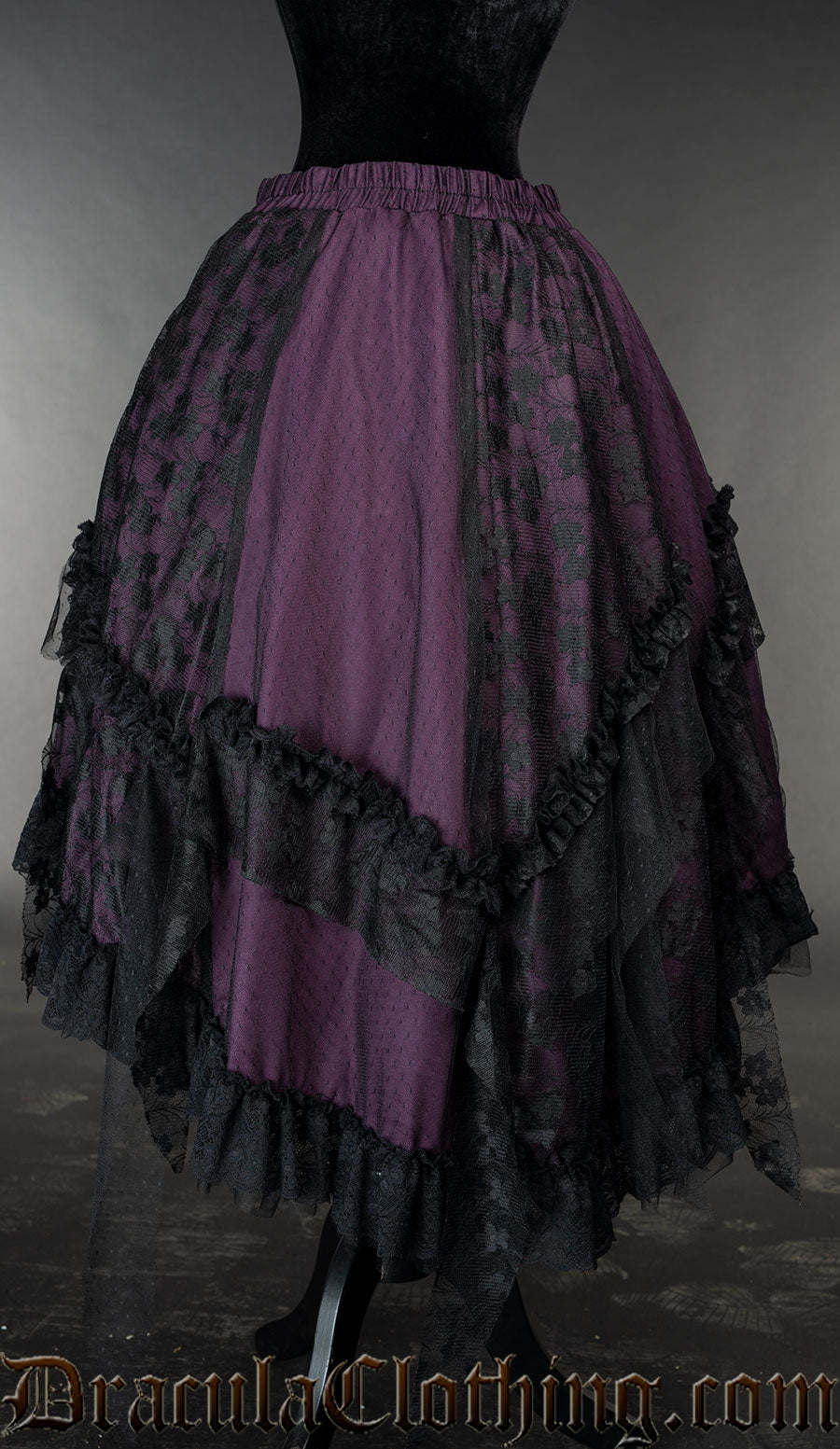 Back view of purple and black satin and lace skirt showing elasticated waistband and details