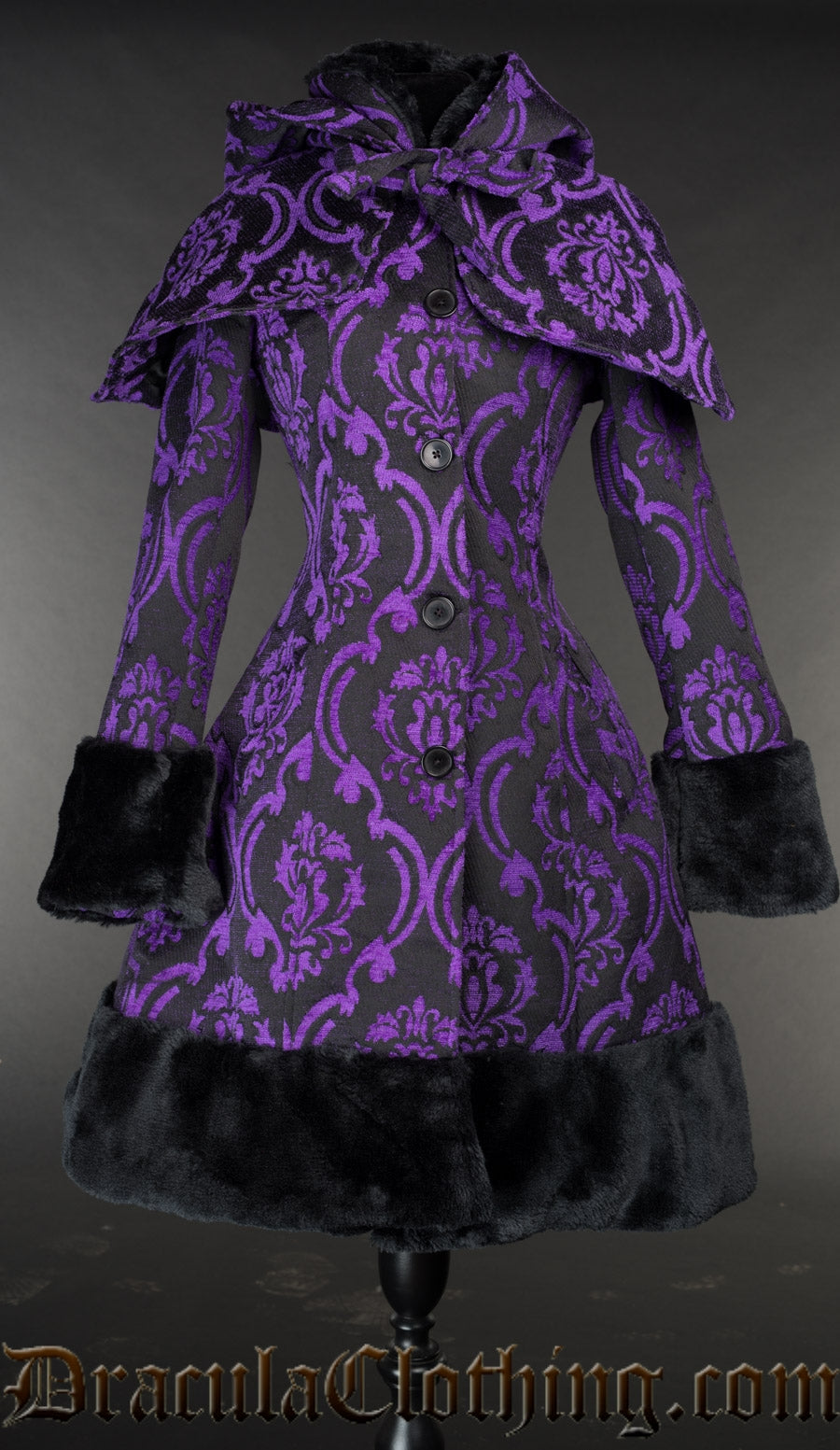 Purple and black women's winter coat made from cotton brocade jacquard and faux fur accents with removable hood and cape
