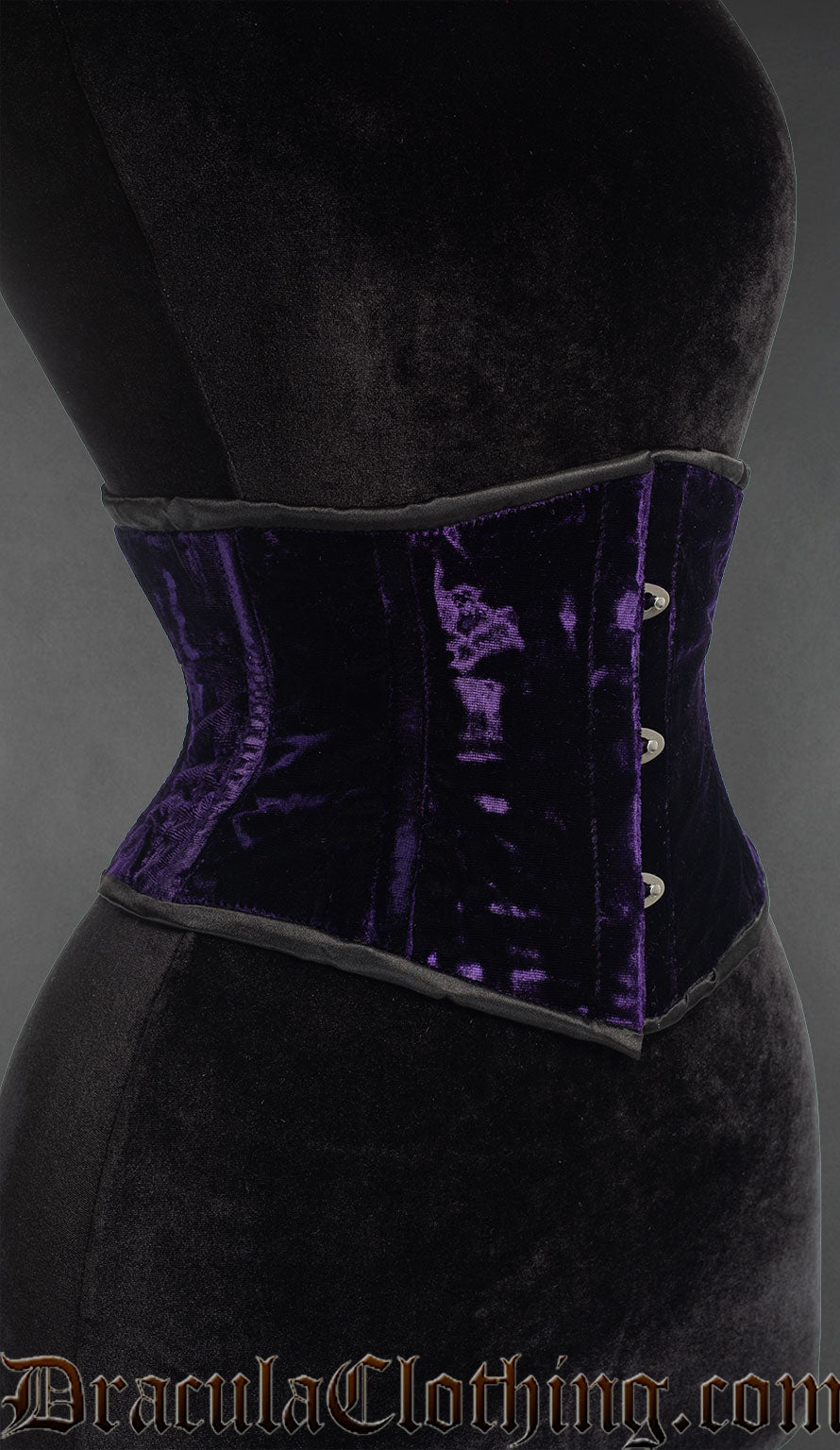 Purple velvet waist cincher corset, side view with front busk closure