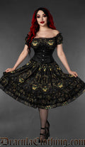 Women's knee length multicoloured dark dress featuring printed sphinx cat in top hat worn by model with waist cincher