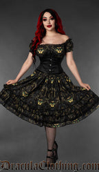 Women's knee length multicoloured dark dress featuring printed sphinx cat in top hat worn by model with waist cincher