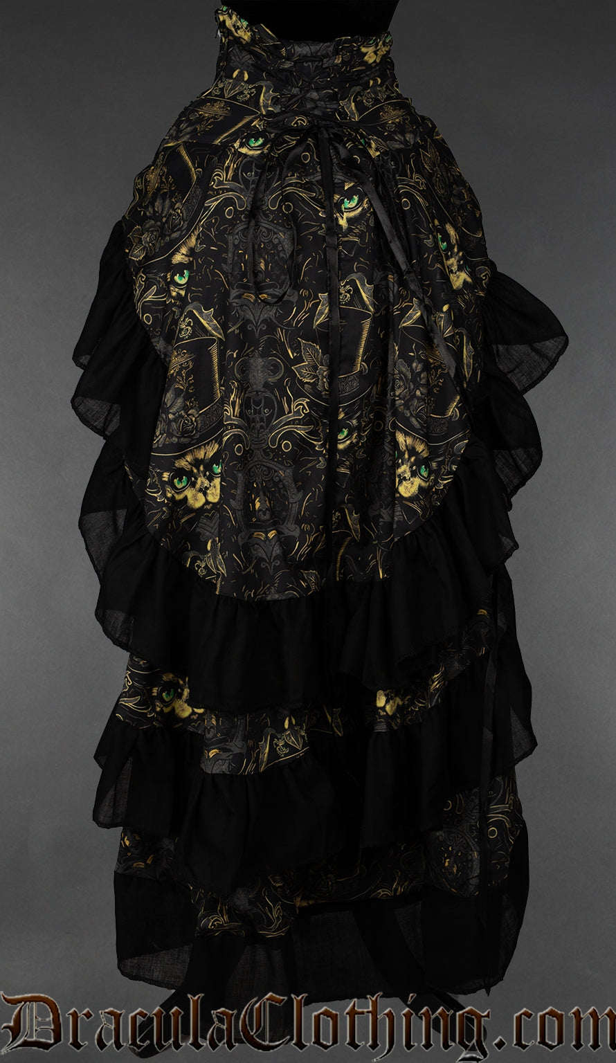 Back view of cat print women's bustle skirt showing three layers in the back with a black hem on each and adjustable lacing in the waist