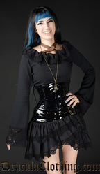 Model wearing pvc waist cincher with skirt and blouse