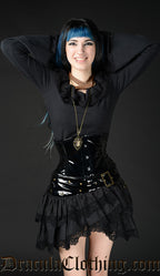 Model wearing black PVC waist cincher with a blouse and skirt