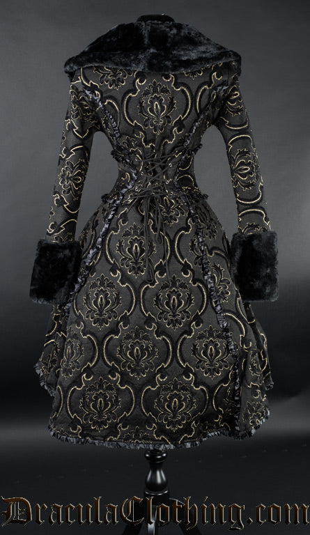 Back view of women's black and gold coat showing adjustable corset style lacing in the torso