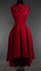 Women's red brocade high low dress with sheer lace chest panel topped with a bat shaped collar