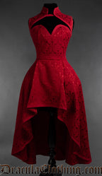 Women's sleeveless high low red cotton brocade dress with queen anne style neckline and high neck collar