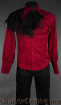 Red brocade gothic shirt with black ruffled jabot, pointed collar, and long sleeves on mannequin