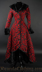 Button up high low women's coat made with black and red cotton jacquard fabric and black faux fur collar and sleeve cuffs