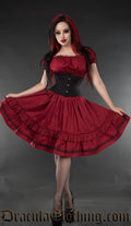 Women's red cotton knee length dress worn by model with additional black waist cincher
