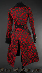 Back view of women's red and black coat in a brocade damask pattern showing half belt with decorative buttons on back