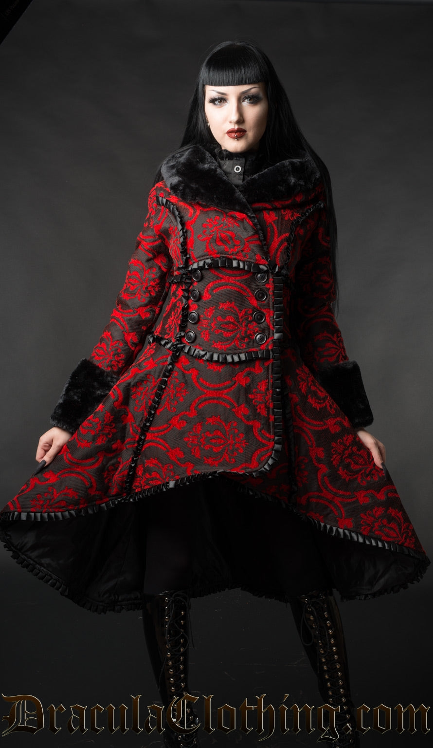 Women's red and black jacquard winter coat with wrap closure satin trim details and faux fur accents in a high low style