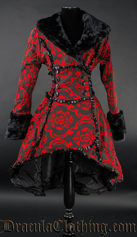 Women's red and black brocade winter coat in a high low style with black faux fur accents and satin trim details on a wrap closure