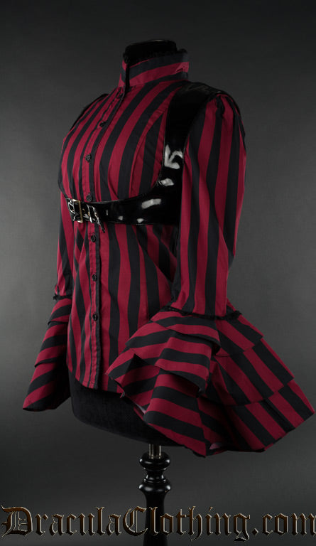 Side view of red striped buckle blouse showing dramatic flared trumpet sleeves