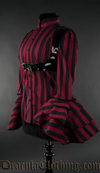 Side view of red striped buckle blouse showing dramatic flared trumpet sleeves