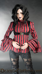 Model wearing red and black striped blouse showing layered and flared trumpet sleeves