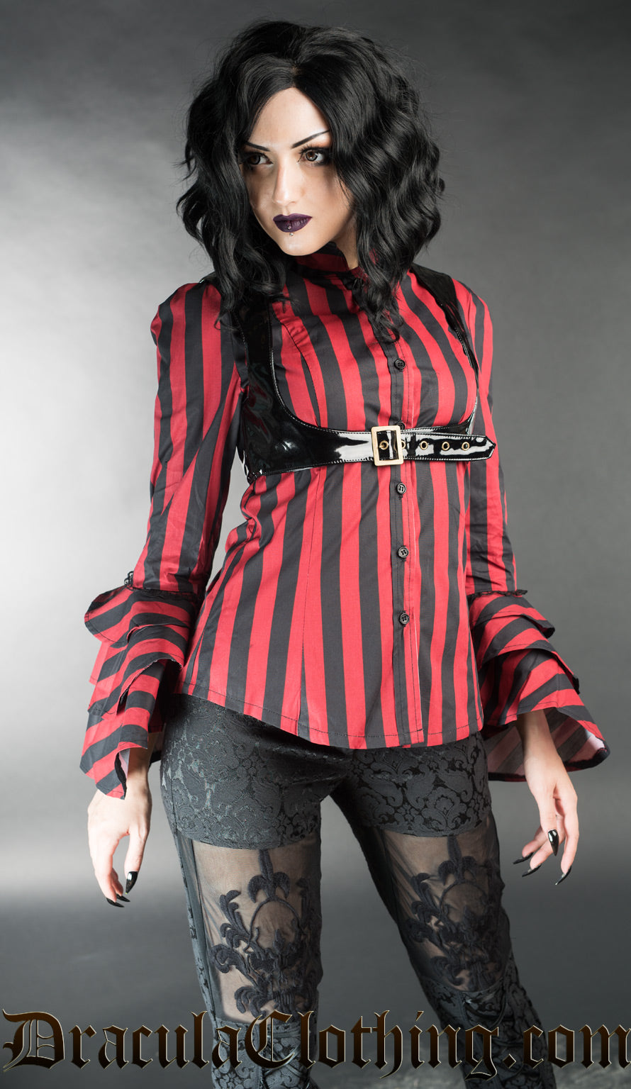Model wearing women's red striped blouse
