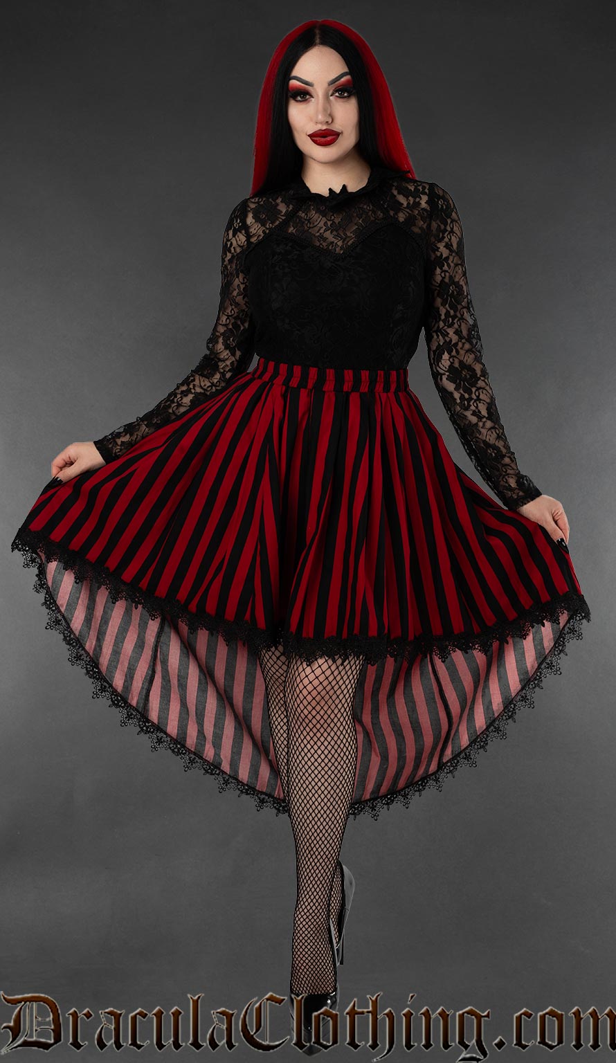 Women's red and black striped high low skirt with black lace trim hem worn by a model 