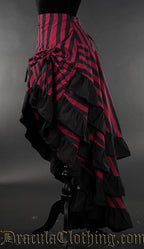 Side view of women's red and black striped bustle skirt showing high low style hem and three layers of fabric