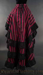 Back view of women's black and red striped bustle skirt showing three layers with black hem and adjustable corset style lacing in the waist