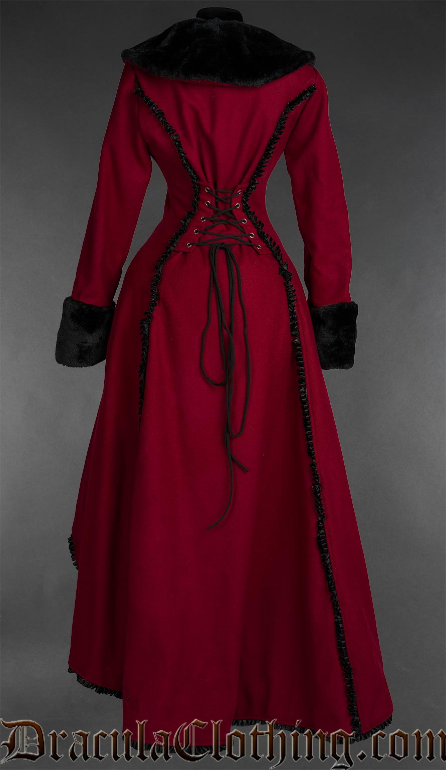 Back view of Red wool gothic princess coat with black faux fur trim and dramatic Victorian silhouette with pockets