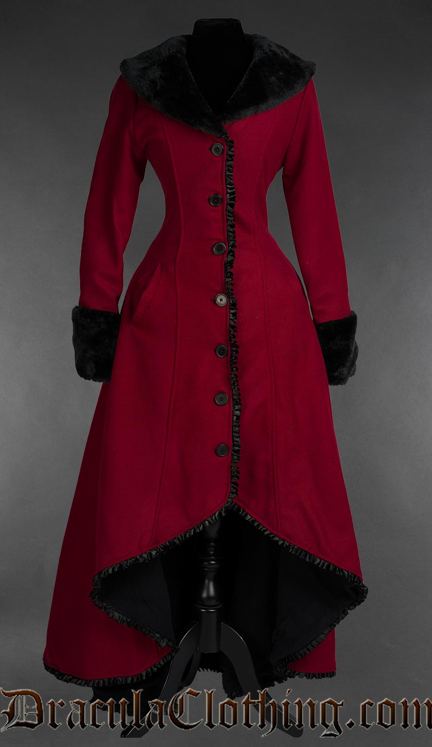 Front view of Red wool gothic princess coat with black faux fur trim and dramatic Victorian silhouette with pockets