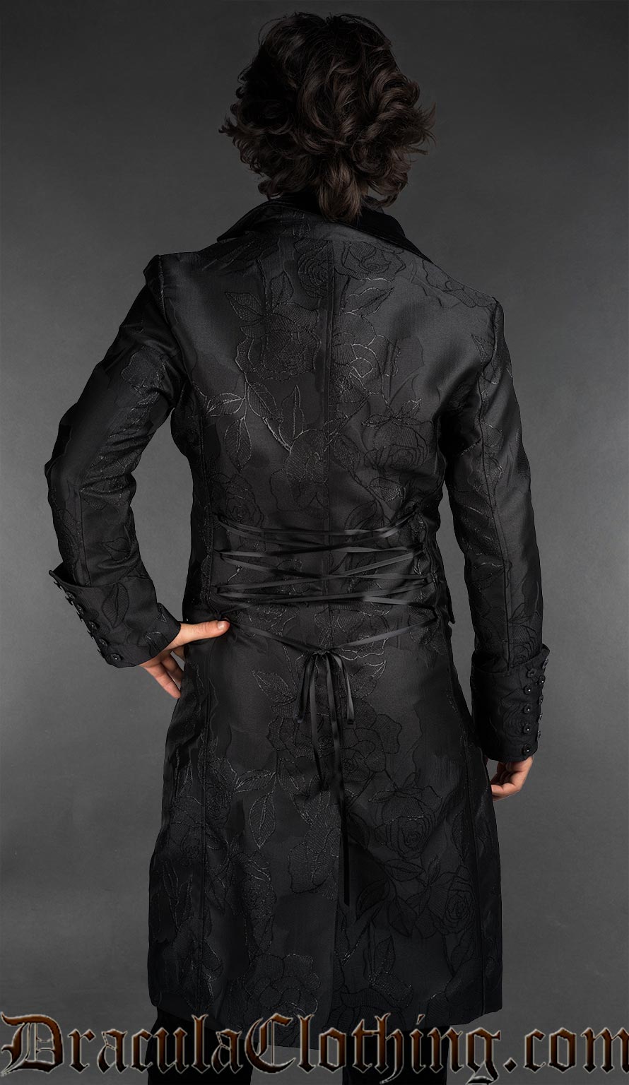 Back view of goth long brocade coat with a rose pattern and velvet details