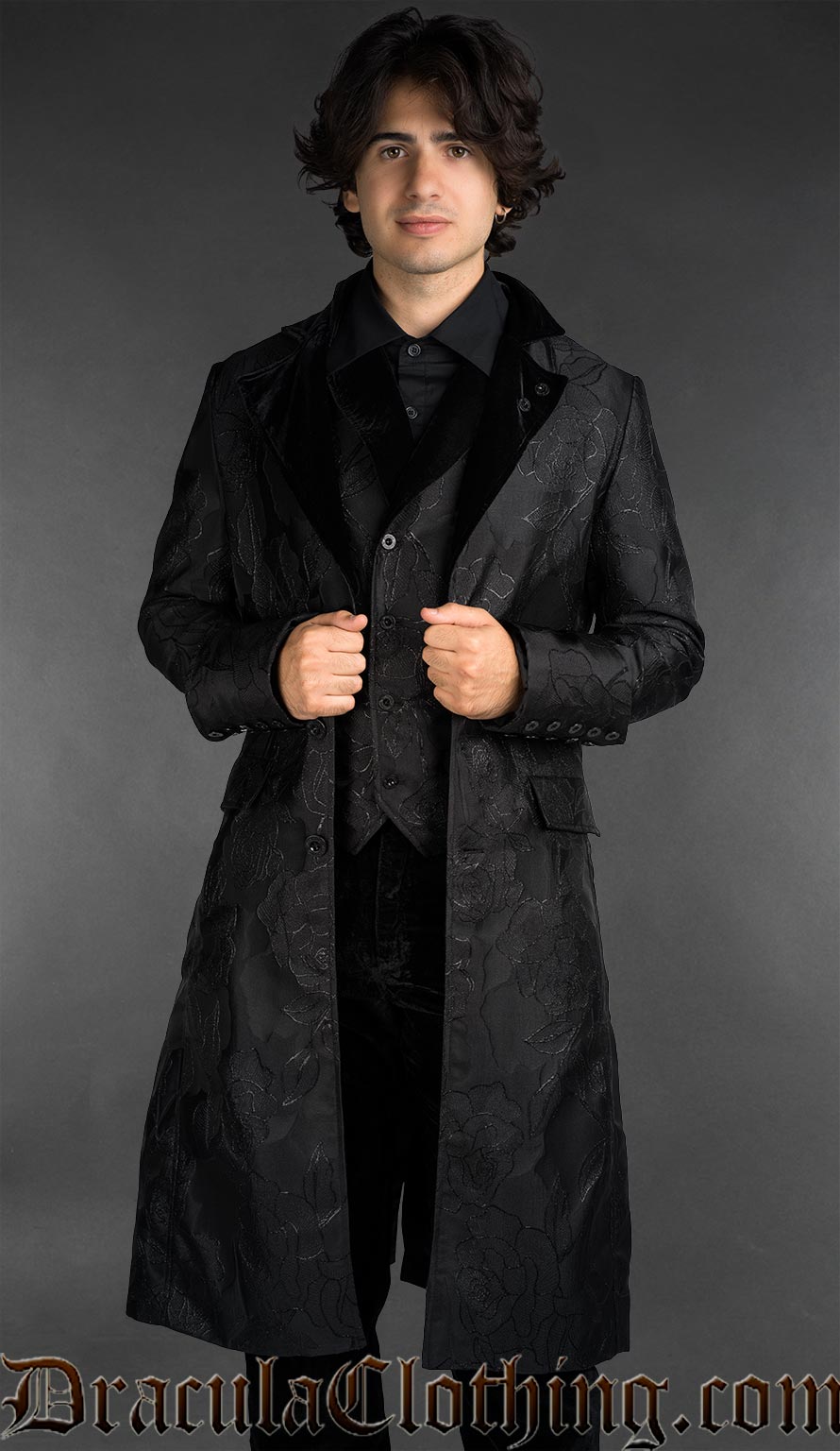 Black long coat in a rose pattern brocade with velvet lapels