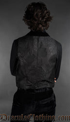 Back view of Goth black brocade vest with a rose pattern and velvet details