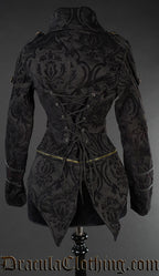 Back view of black brocade jacket showing tailcoat style zipped attachment and adjustable lacing in torso
