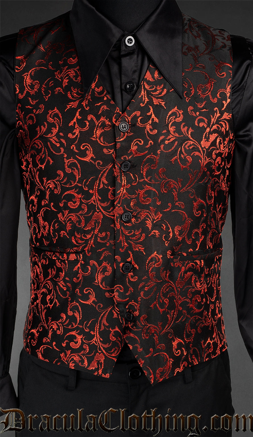 Men's black vest waistcoat with red woven brocade details shown over a black shirt