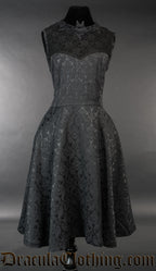 Black brocade women's dress with bat collar