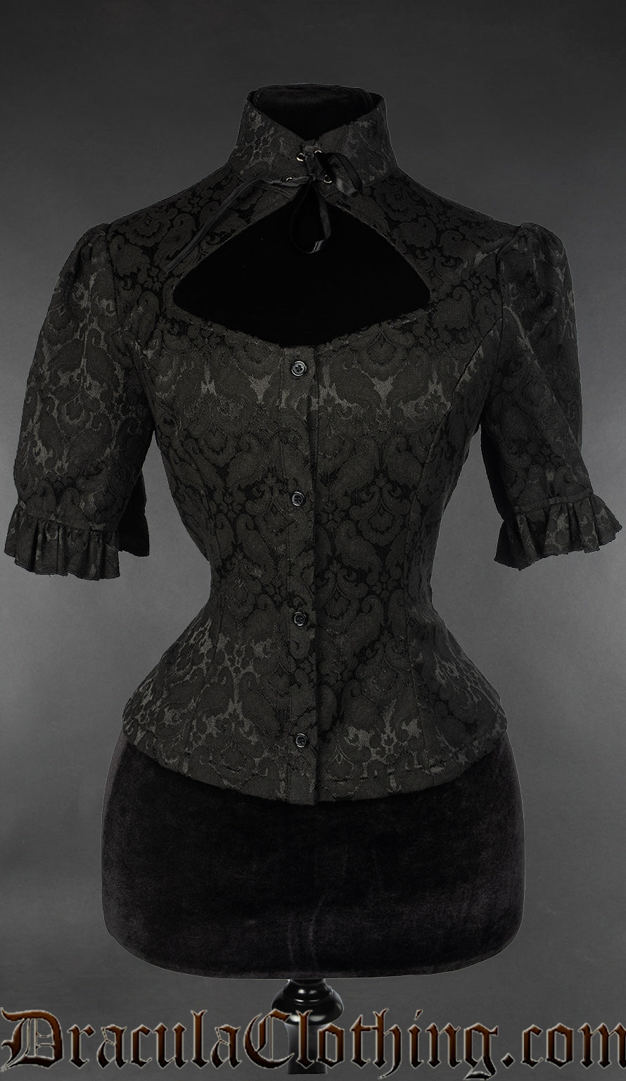 Women's black brocade keyhole blouse with high neck collar and mid length sleeves with ruffled cuffs