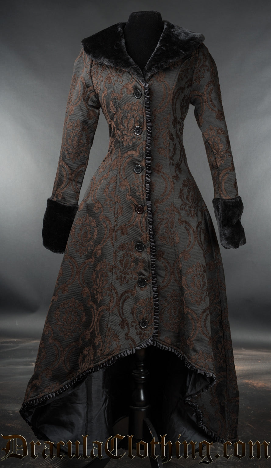Women's high low coat made from black and brown brocade in a damask pattern with faux fur and satin details
