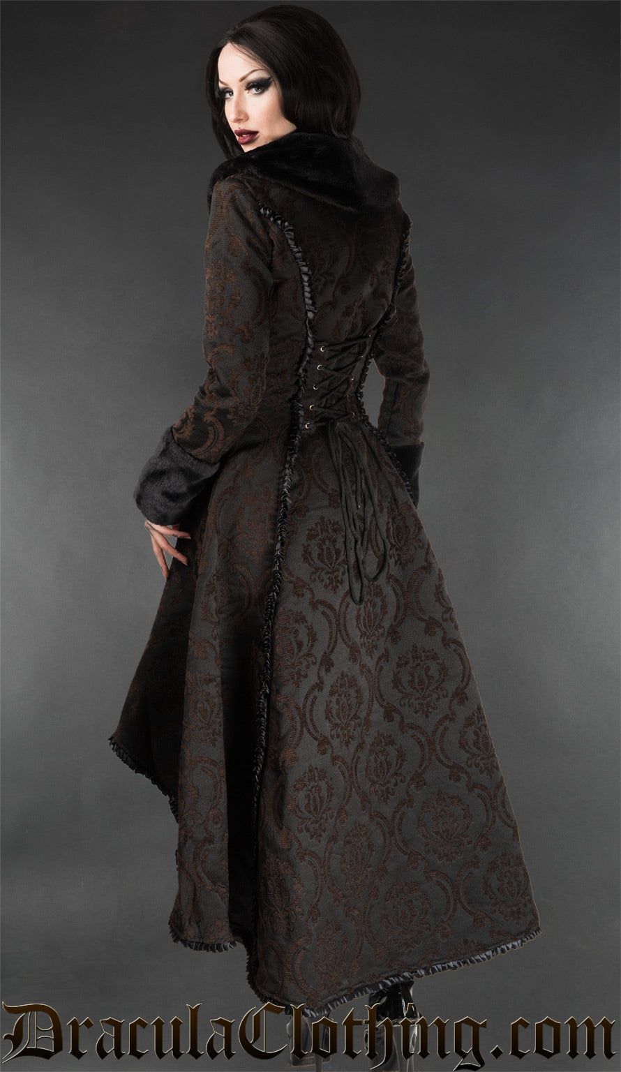 Back view of women's black and brown damask brocade high low coat showing adjustable corset lacing