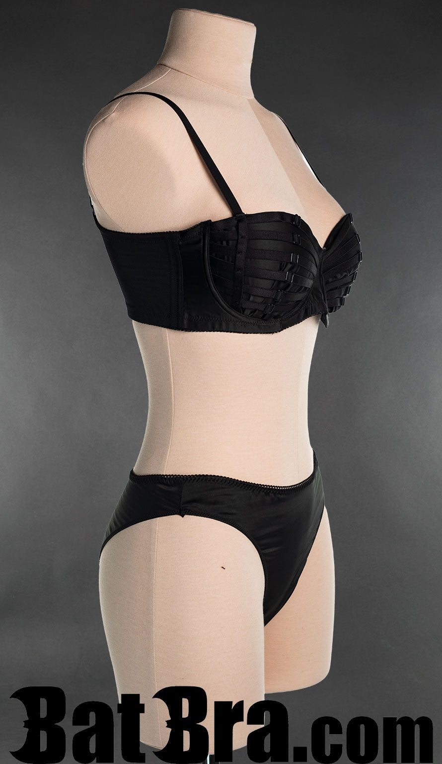 Side view of women's black satin strap bra