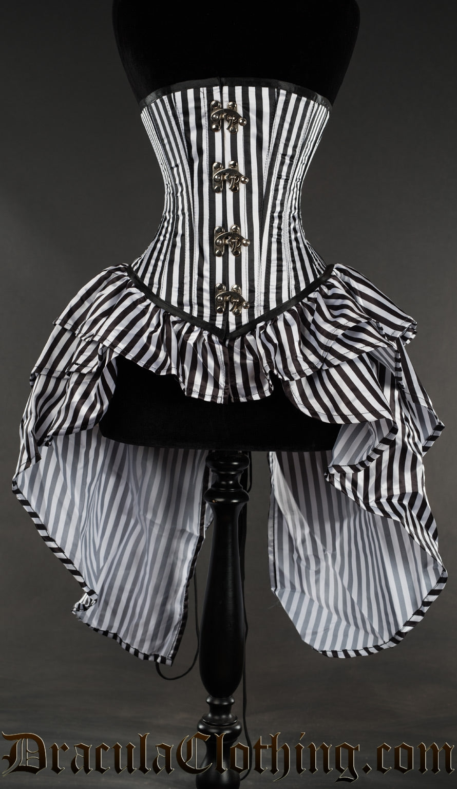 Black and white striped corset with bustle skirt style attachment and clasp closure