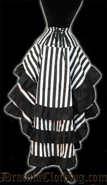 Back view of women's black and white striped layered skirt showing adjustable corset-style lacing in the back and black hem trim on three layers