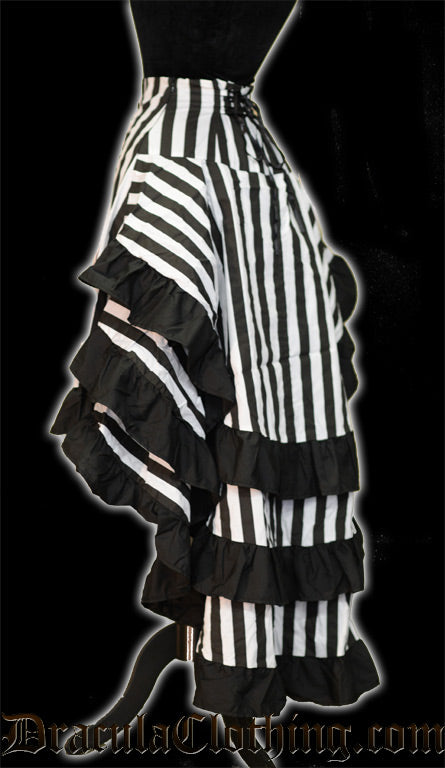 Side view of women's layered bustle skirt with black and white stripes showing three layers of fabric and adjustable lacing in the back