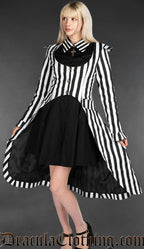 Model wearing women's black and white vertical striped EGA coat over black collared dress