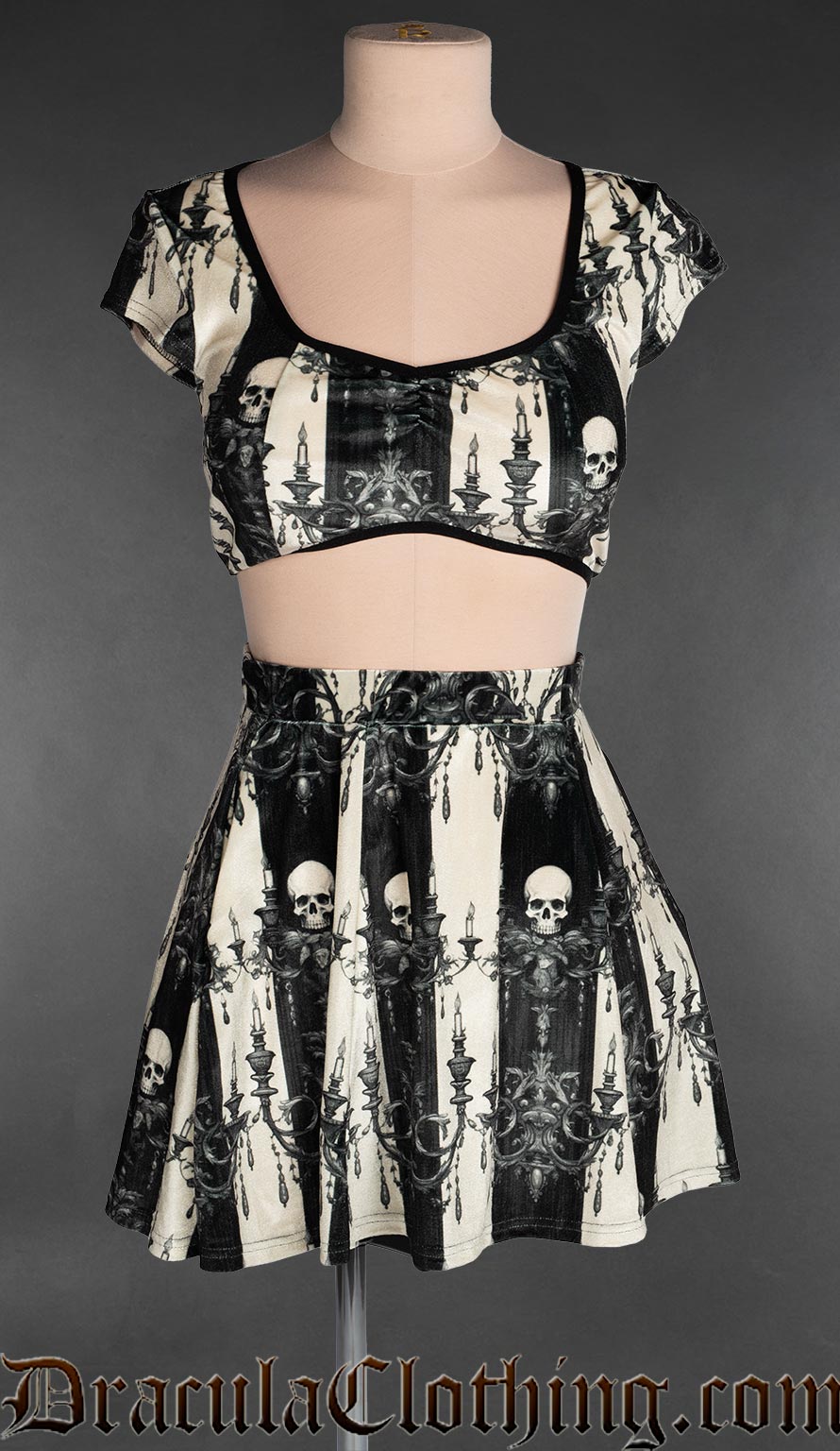 Striped Skull Velvet Crop Top featuring black and ivory gothic stripes, skull and candelabra print, velvet fabric and Victorian-inspired gothic style