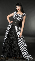 Model wearing floor length gown style black and white striped dress with additional waist cincher
