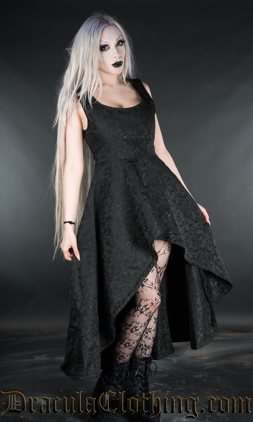 Women's sleeveless gothic black dress with high low hem and woven brocade fabric