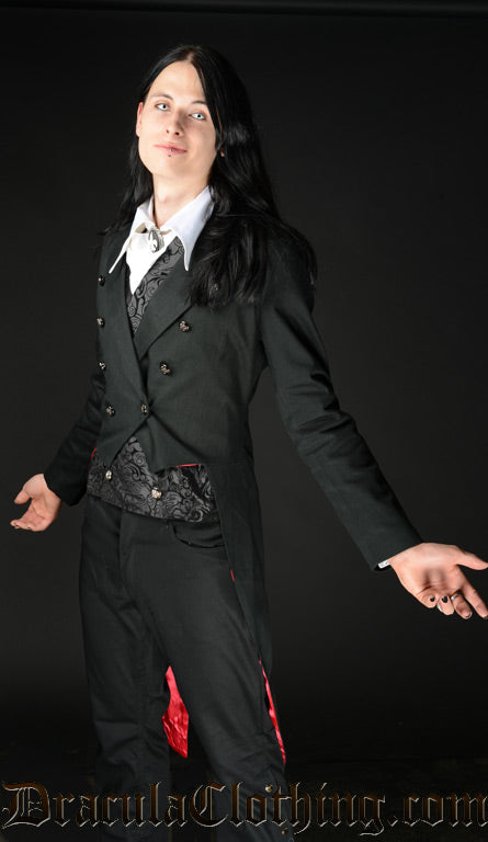 Model wearing men's black tailcoat jacket with decorative buttons and red lining