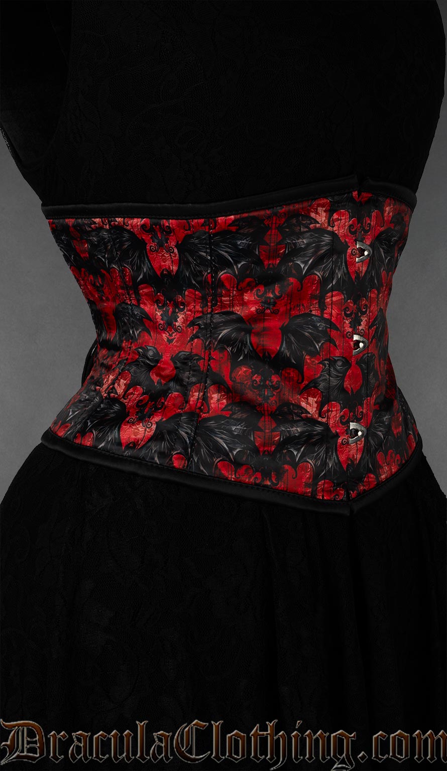 Side view of waist cincher with black bats printed on a red background