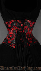 Back view of red and black printed bat waist cincher showing matching modesty panel and adjustable lacing
