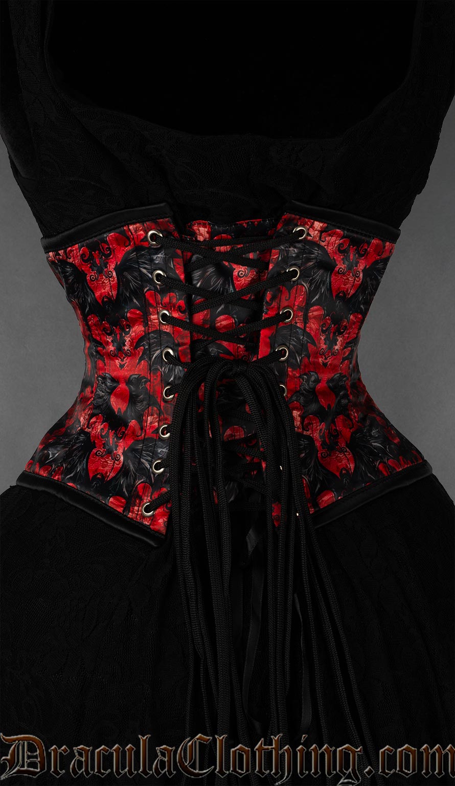 Back view of red and black printed bat waist cincher showing matching modesty panel and adjustable lacing