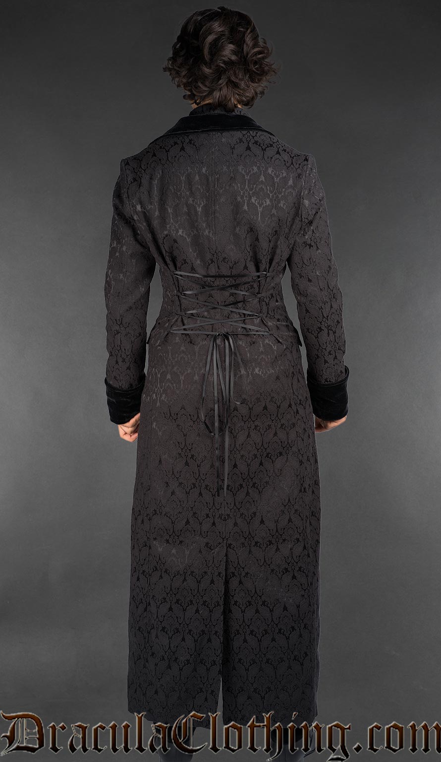 Back view Victorian gothic men’s cotton brocade frock coat with velvet lapels, black vampire gentleman style
