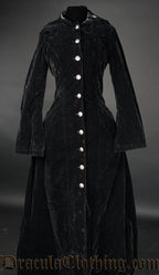 Black velvet women's coat with front button closure and attached hood